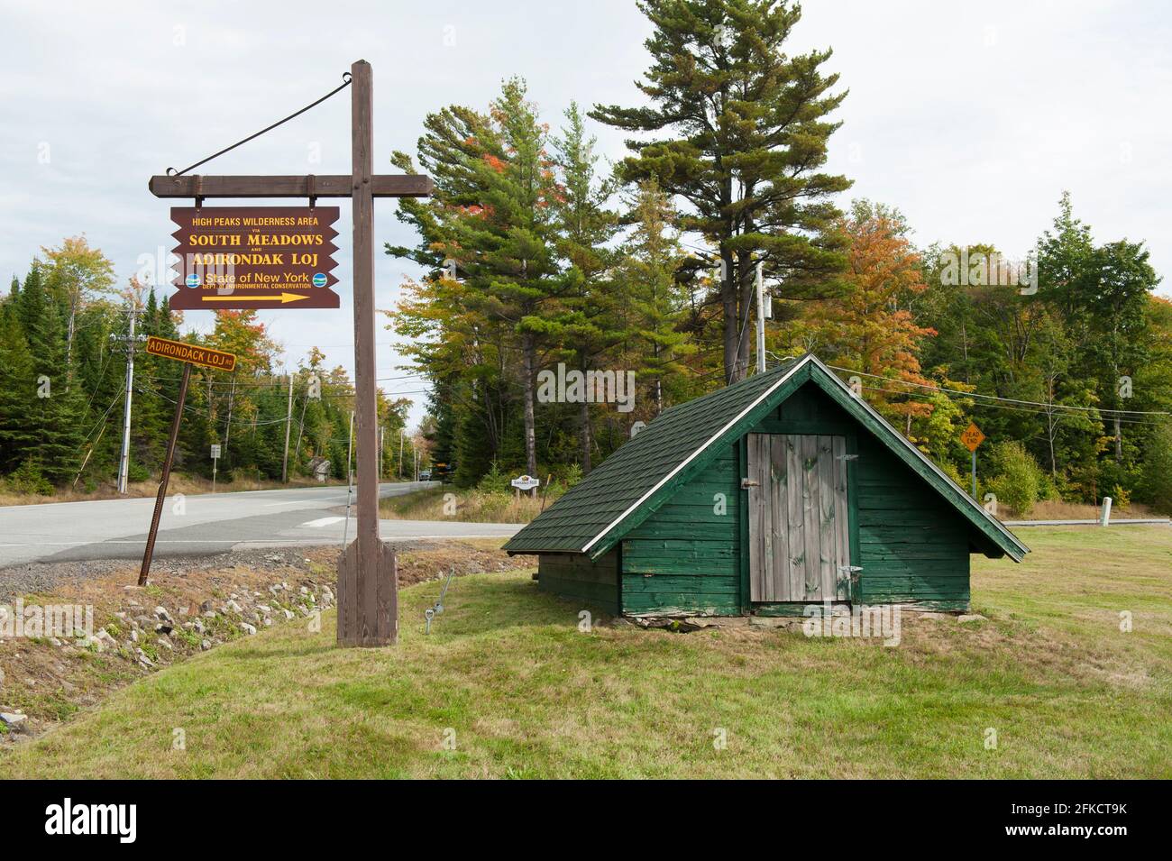 Sign for  Adirondack Loj at the corner of route 73 (Cascade road) and Adirondack Loj road. North Elba, NY state, USA. Stock Photo