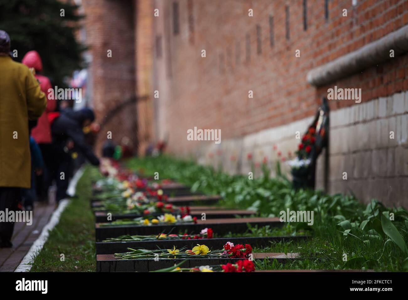 flowers at the memorial fire. the memory of the fallen soldiers in the ...