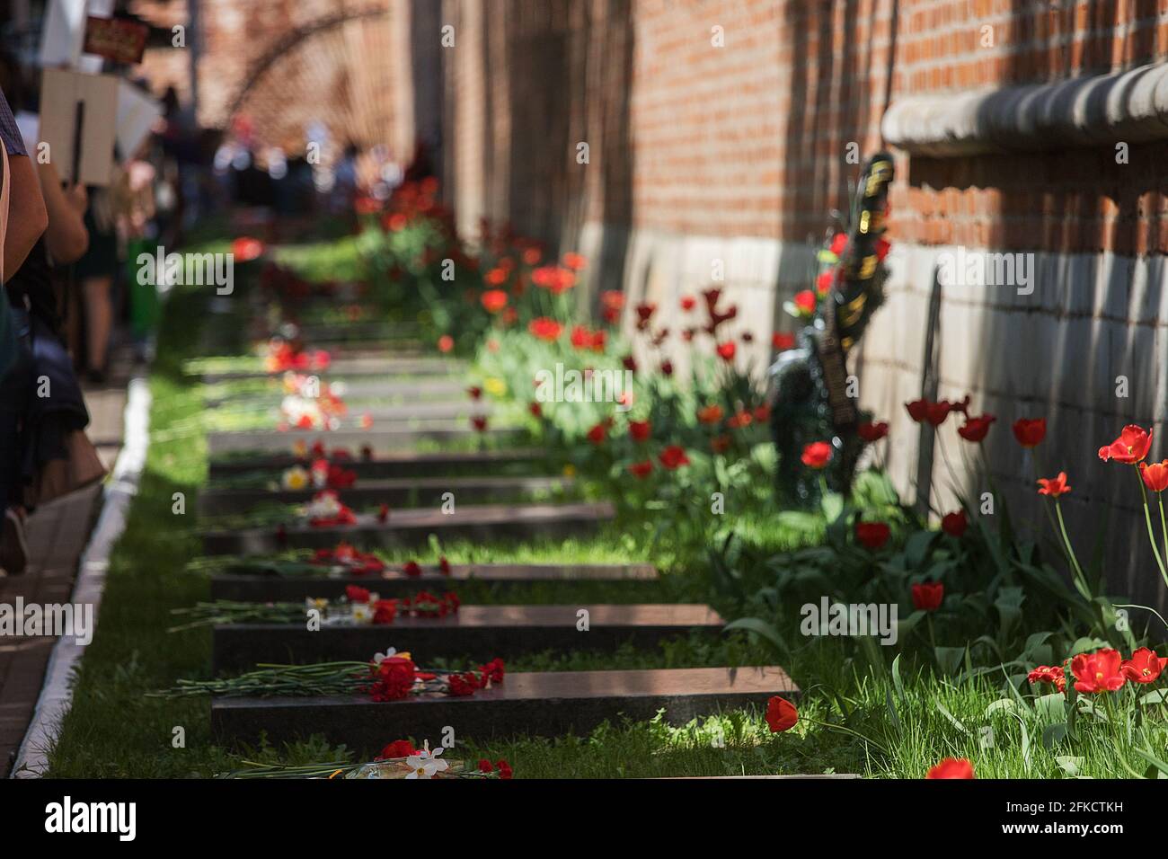 flowers at the memorial fire. the memory of the fallen soldiers in the ...