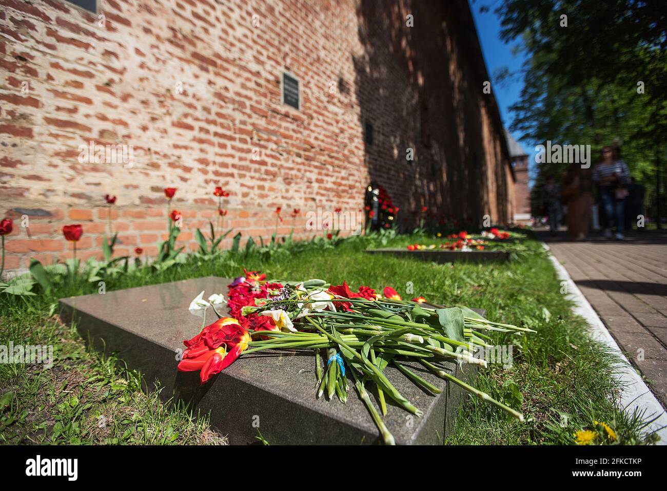 flowers at the memorial fire. the memory of the fallen soldiers in the ...