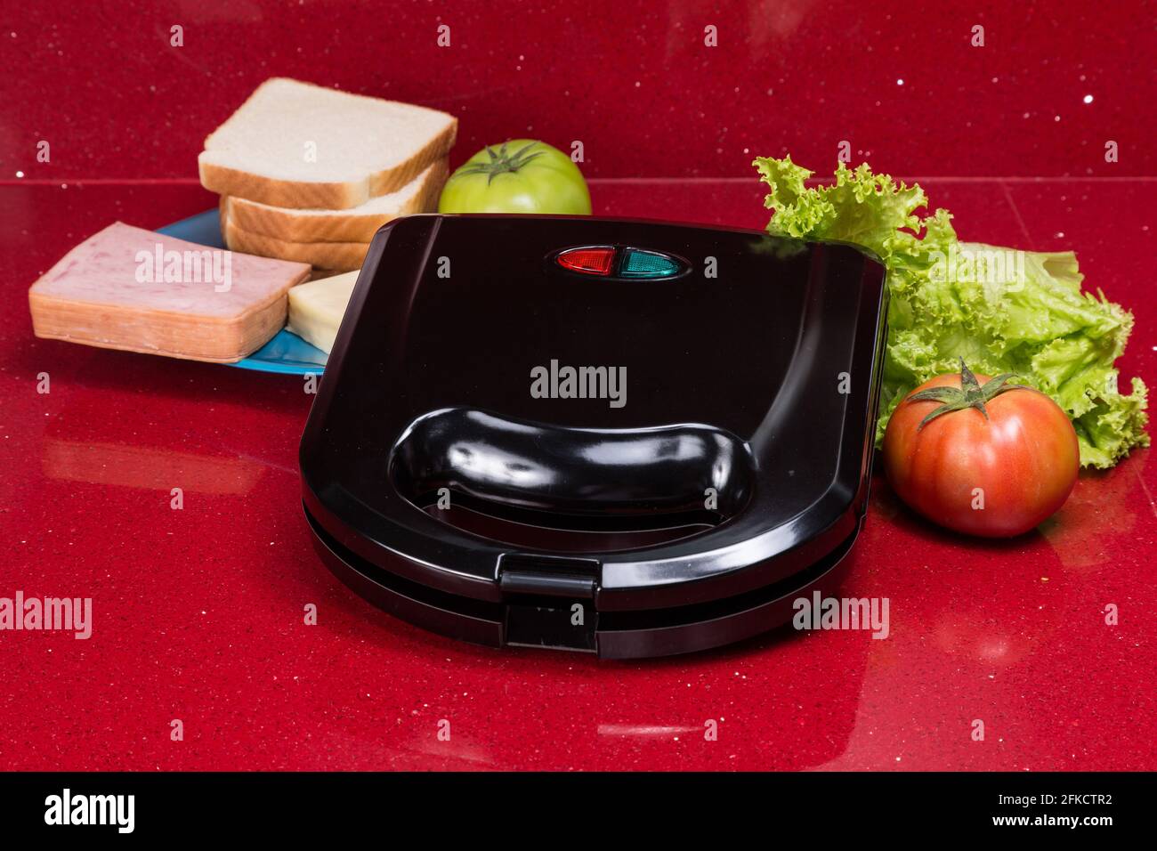 Sandwich maker; photo with ingredients to make sandwiches Stock Photo Alamy