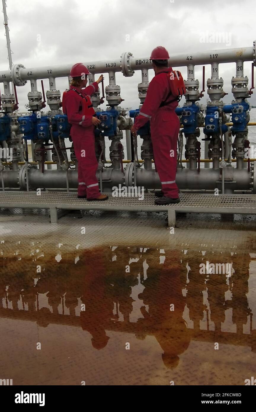 Lake Maracaibo, Venezuela. Pdvsa oil workers ares seen in the rig station of gas and fuel. Photo: José Bula U. Stock Photo