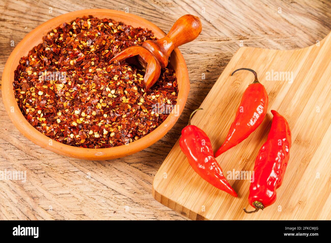 Red pepper or cayenne; Pepper crushed with flakes scattered Stock Photo Alamy