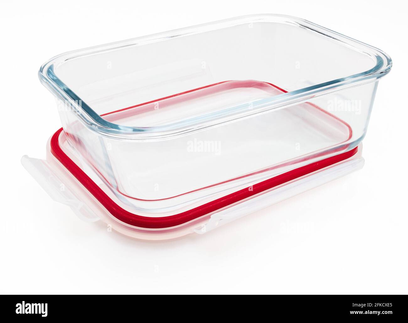 Empty and open glass tupperware. Isolated on white background Stock Photo -  Alamy