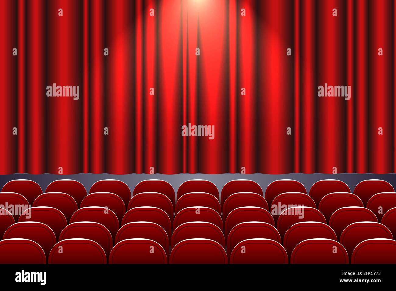 Theater auditorium with rows of red seats and stage with curtain ...