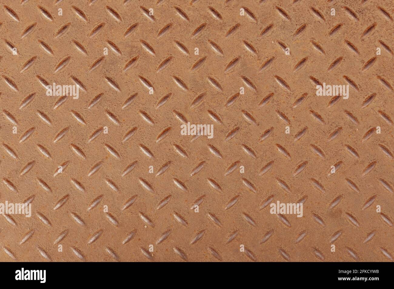 Top view of Slightly rusted steel diamond pattern sheet as background. Stock Photo