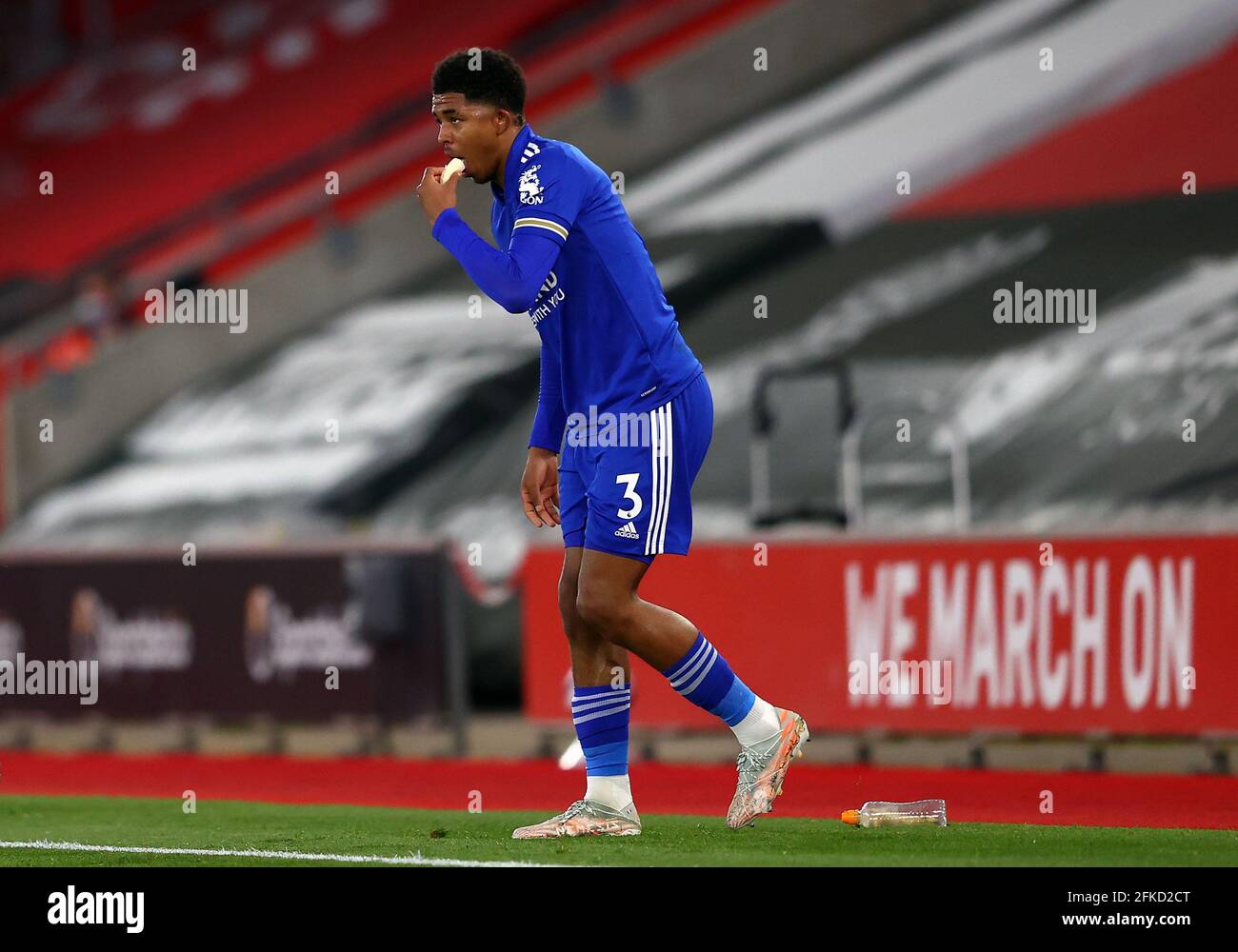 Leicester City's Wesley Fofana breaks his Ramadan fast mid match as he eats a banana during the Premier League match at St. Mary's Stadium, Southampton. Picture date: Friday April 30, 2021. Stock Photo