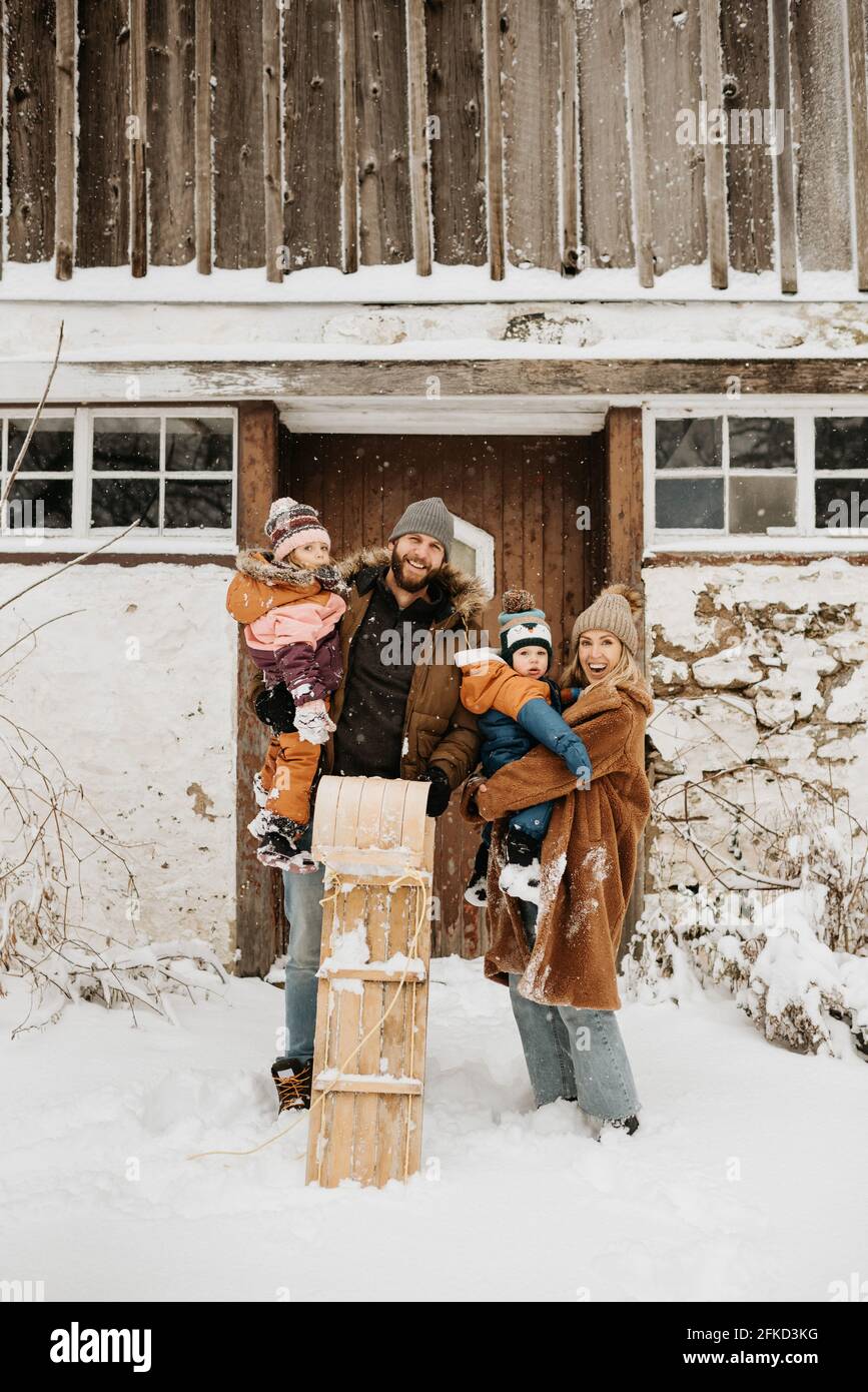 Canada, Ontario, Winter portrait of family with children (12-17 months, 2-3) Stock Photo