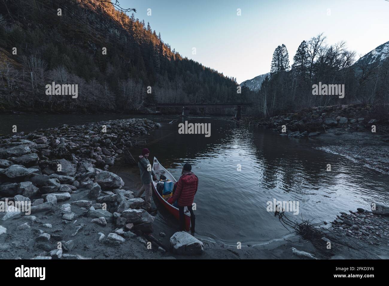Canada, British Columbia, Man and woman canoeing in Squamish River Stock Photo