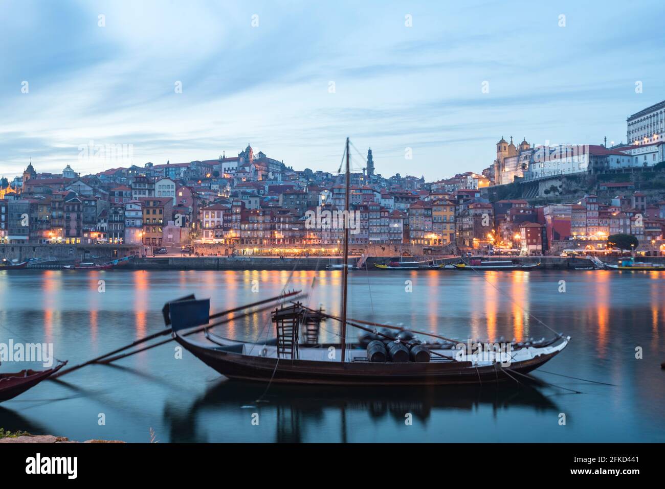 Portugal, Porto, Traditional rabelo boats on Douro river at dusk Stock Photo
