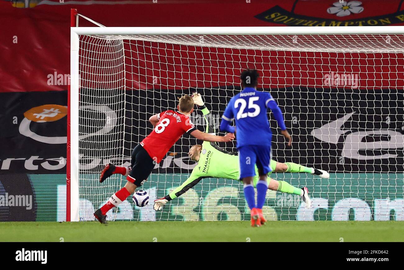 Southampton's James Ward-Prowse scores their side's first goal of the game for the penalty spot past Leicester City goalkeeper Kasper Schmeichel during the Premier League match at St. Mary's Stadium, Southampton. Picture date: Friday April 30, 2021. Stock Photo