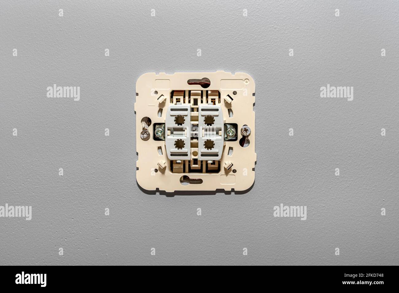 The up-down shutter switch is mounted in the electrical box in the gray ...