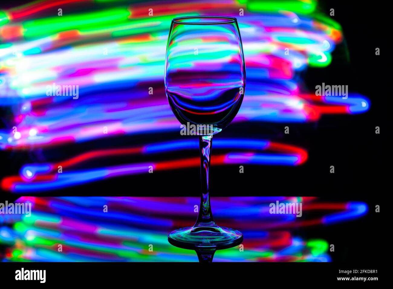 wine glass against the background of colored bright stripes Stock Photo ...