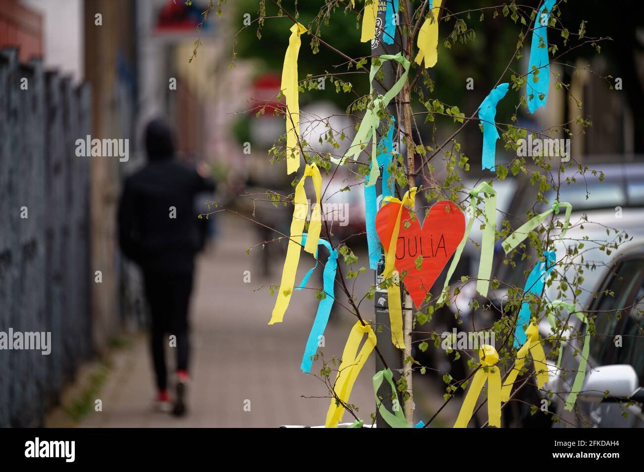 Cologne, Germany. 30th Apr, 2021. A maypole stands by a traffic sign on ...