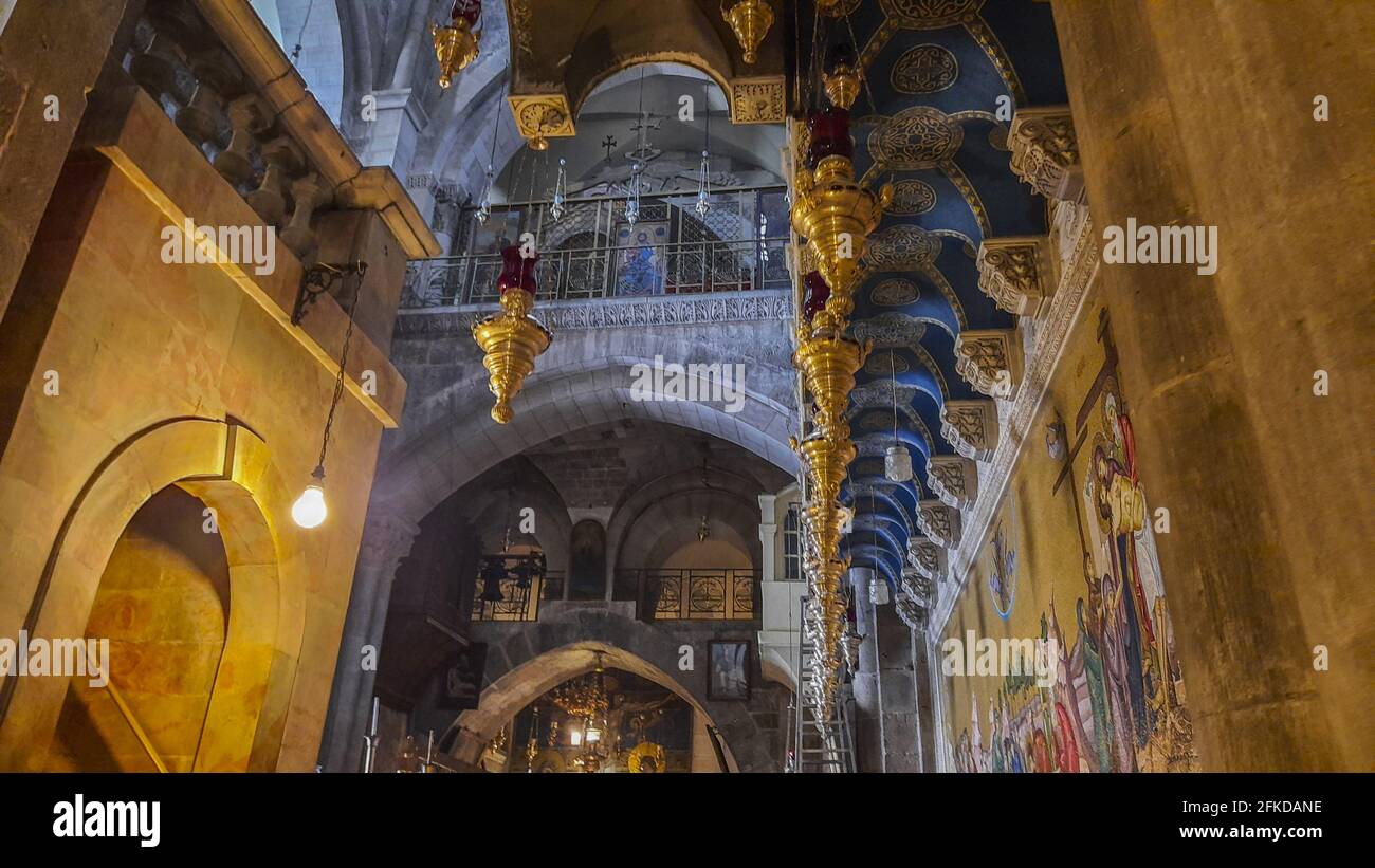 The Church of the Holy Sepulchr is a church in the Christian Quarter of the Old City of Jerusalem and it contains the two holiest sites in Christianit Stock Photo
