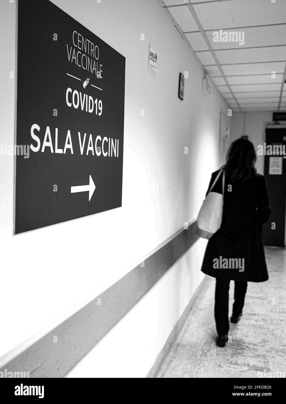 Rome, Italy. 30th Apr, 2021. A young girl goes to receive a dose of the Pfizer/BioNTech COVID-19 vaccine at the Covid-19 Vaccine hub inside the Columbus - Policlinico Gemelli, on April 30, 2021 in Rome, Italy. (Photo by Silvia Loré/Sipa USA) Credit: Sipa USA/Alamy Live News Stock Photo