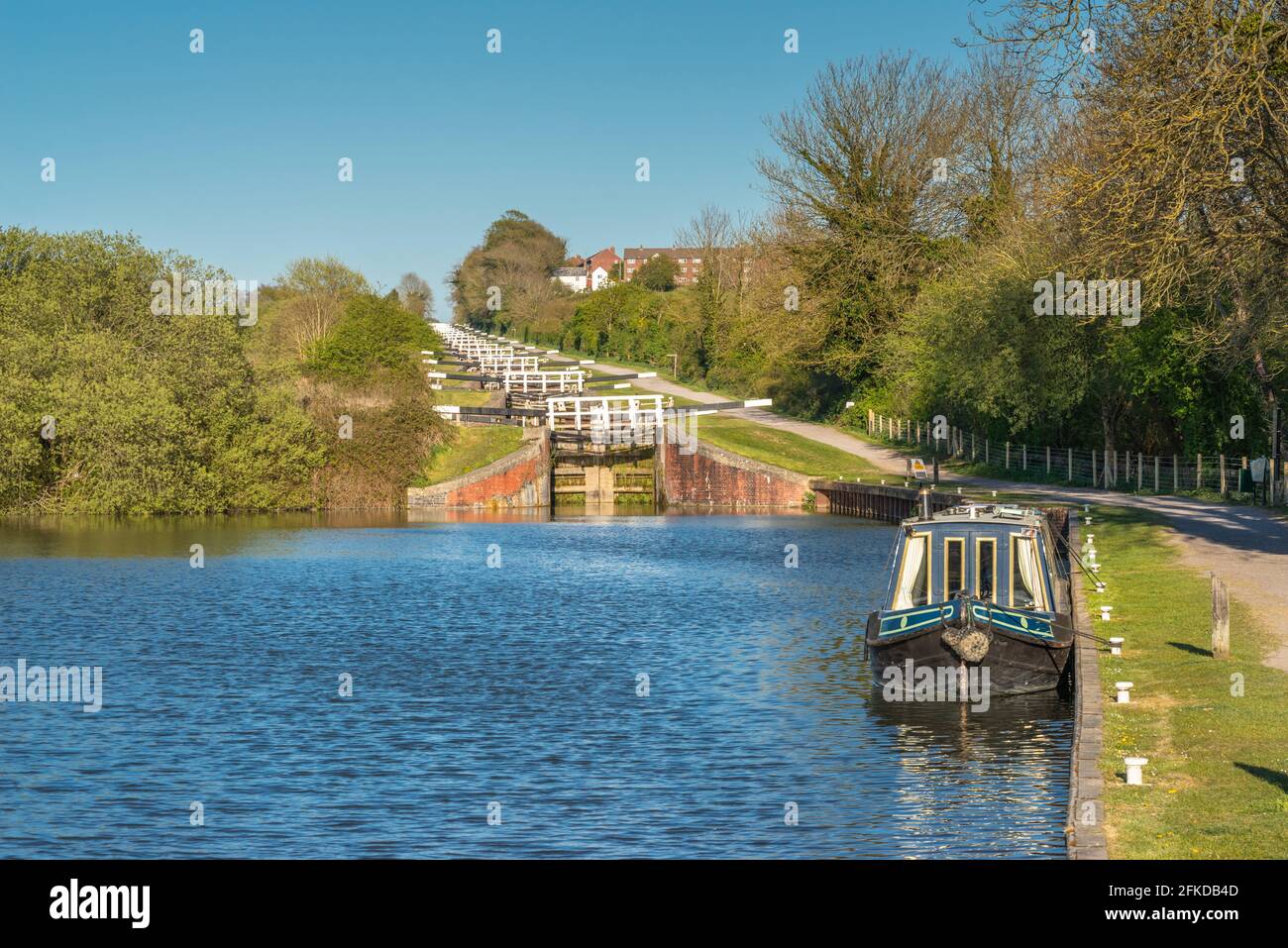 Caen Hill Locks - a lock flight near Devizes along the Kennet & Avon Canal in Wiltshire during Spring 2021, England, UK Stock Photo