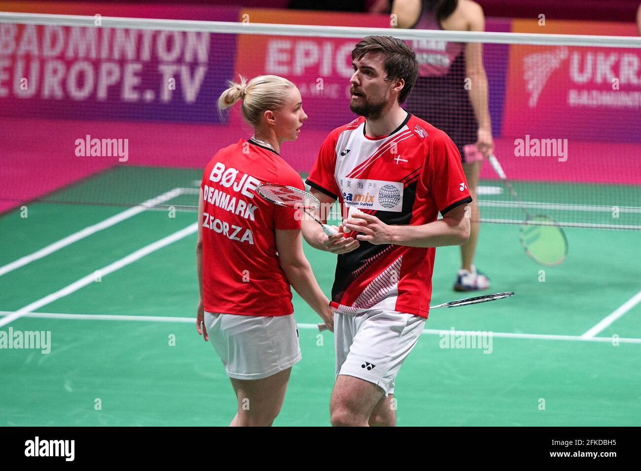 KYIV, UKRAINE - APRIL 30: Mathias Christiansen of Denmark and Alexandra Boje  of Denmark interact in their Mixed Doubles match against Ronan Labar of  France and Anne Tran of France during Day