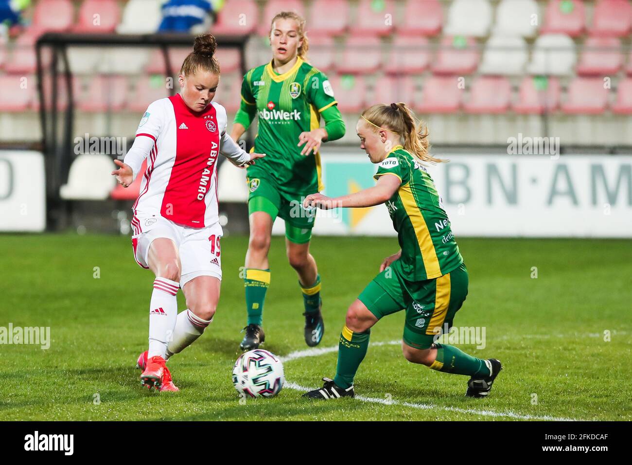 AMSTERDAM, NETHERLANDS - APRIL 30: Kayra Nelemans of ADO Den Haag, Nikita Tromp of Ajax during the Play offs eredivisie vrouwen match between Ajax and ADO Den Haag at De Toekomst on April 30, 2021 in Amsterdam, Netherlands (Photo by Albert ten Hove/Orange Pictures) Stock Photo