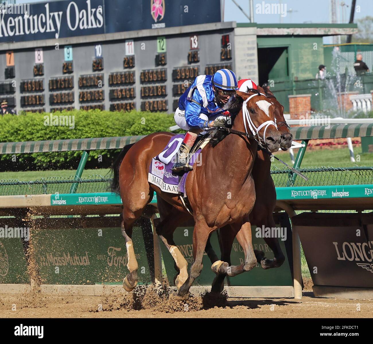 Louisville, United States. 30th Apr, 2021. Malathaat, ridden by John Velazquez, edges out Search Results, Irad Ortiz up, to win the 147th running of the Kentucky Oaks at Churchill Downs in Louisville, Kentucky, Friday, April 30th. Photo by Mark Abraham/UPI Credit: UPI/Alamy Live News Stock Photo