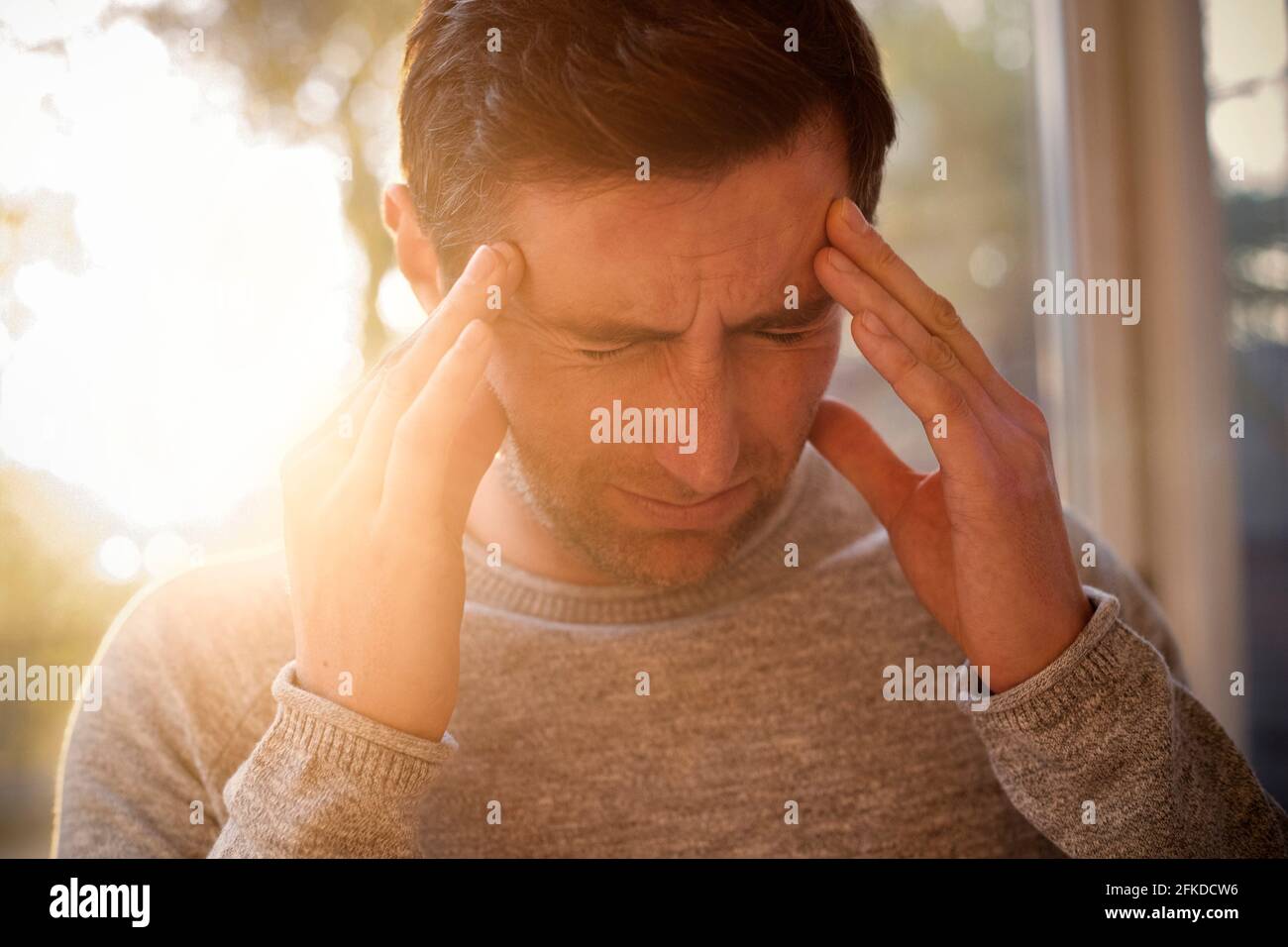Man with headache Stock Photo