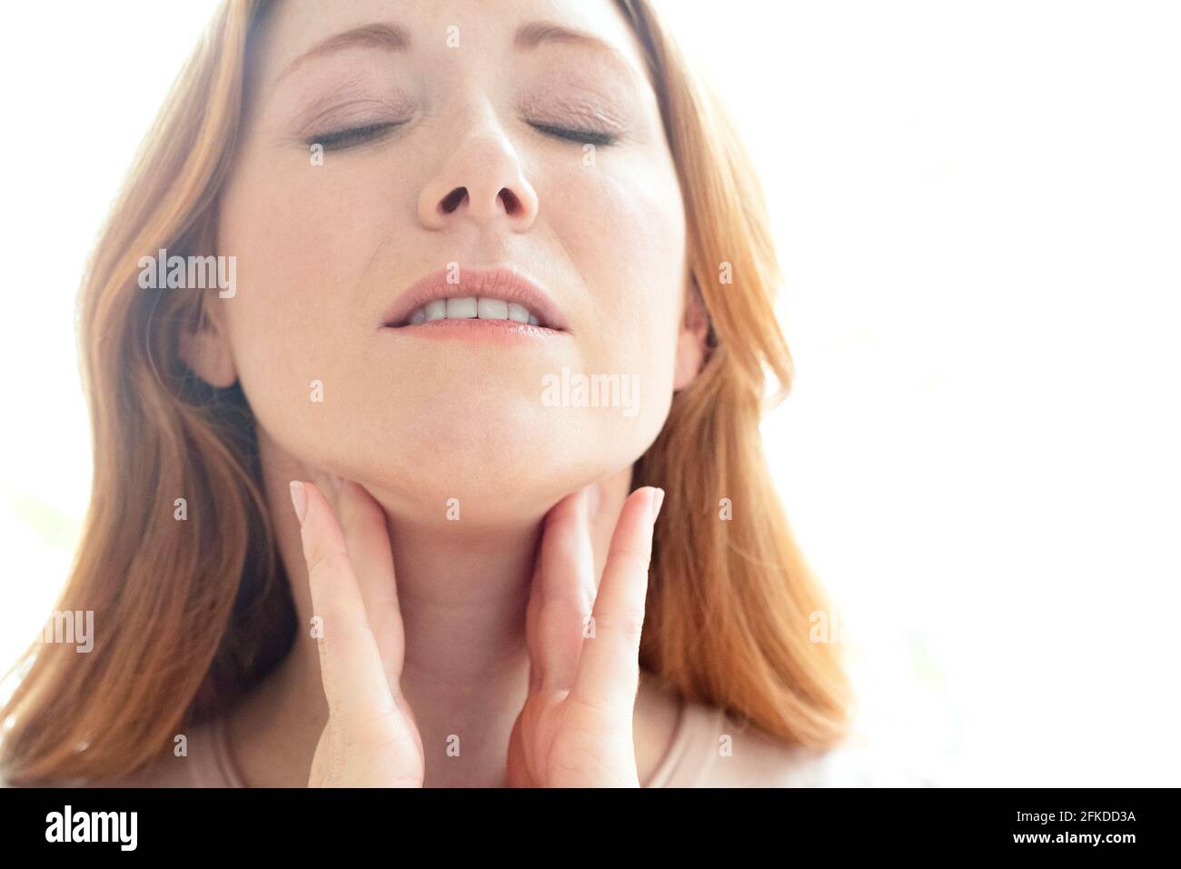 Woman with swollen lymph nodes Stock Photo Alamy