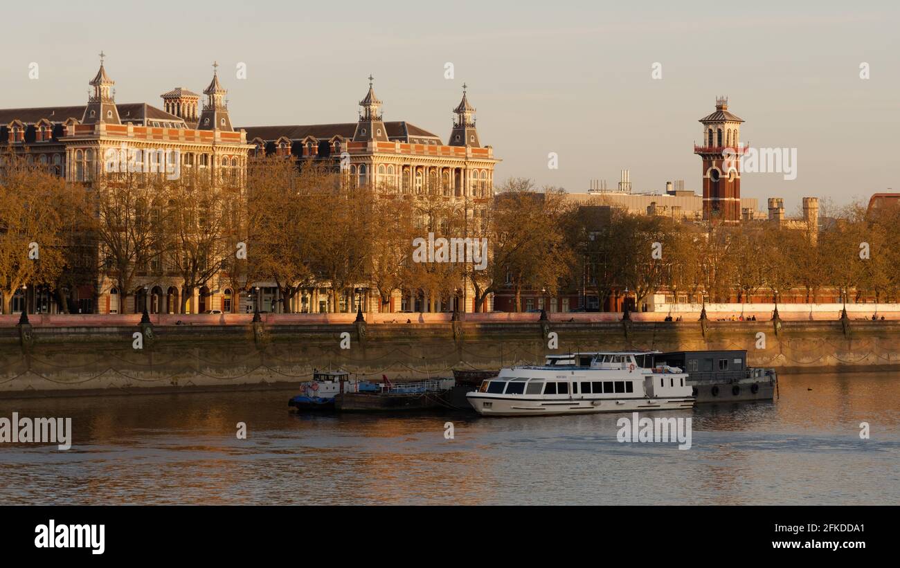 London, Greater London, England - Apr 24 2021:  St Thomas' hospital on the south bank of the River Thames in the evening light. Stock Photo