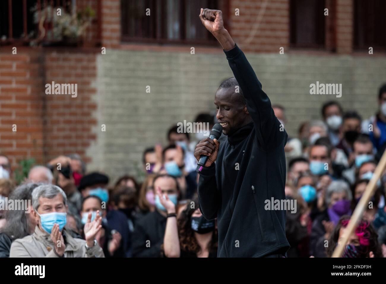 Madrid, Spain. 30th Apr, 2021. Serigne Mbaye, number 9 of Unidas Podemos for the elections to the Assembly of Madrid, during a rally in Vallecas neighborhood. Unidas Podemos continue to present their candidature for the next regional elections of Madrid that will take place on the 4th of May 2021. Credit: Marcos del Mazo/Alamy Live News Stock Photo