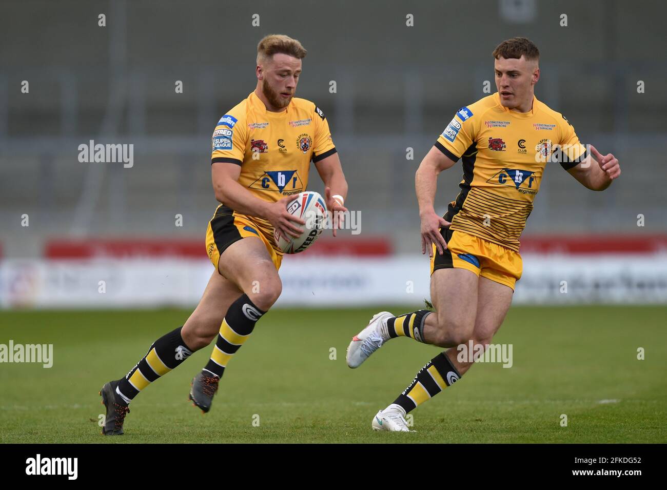Eccles, UK. 30th Apr, 2021. Danny Richardson (7) of Castleford Tigers supported by Jake Trueman (6) of Castleford Tigers in Eccles, United Kingdom on 4/30/2021. (Photo by Richard Long Photography/News Images/Sipa USA) Credit: Sipa USA/Alamy Live News Stock Photo