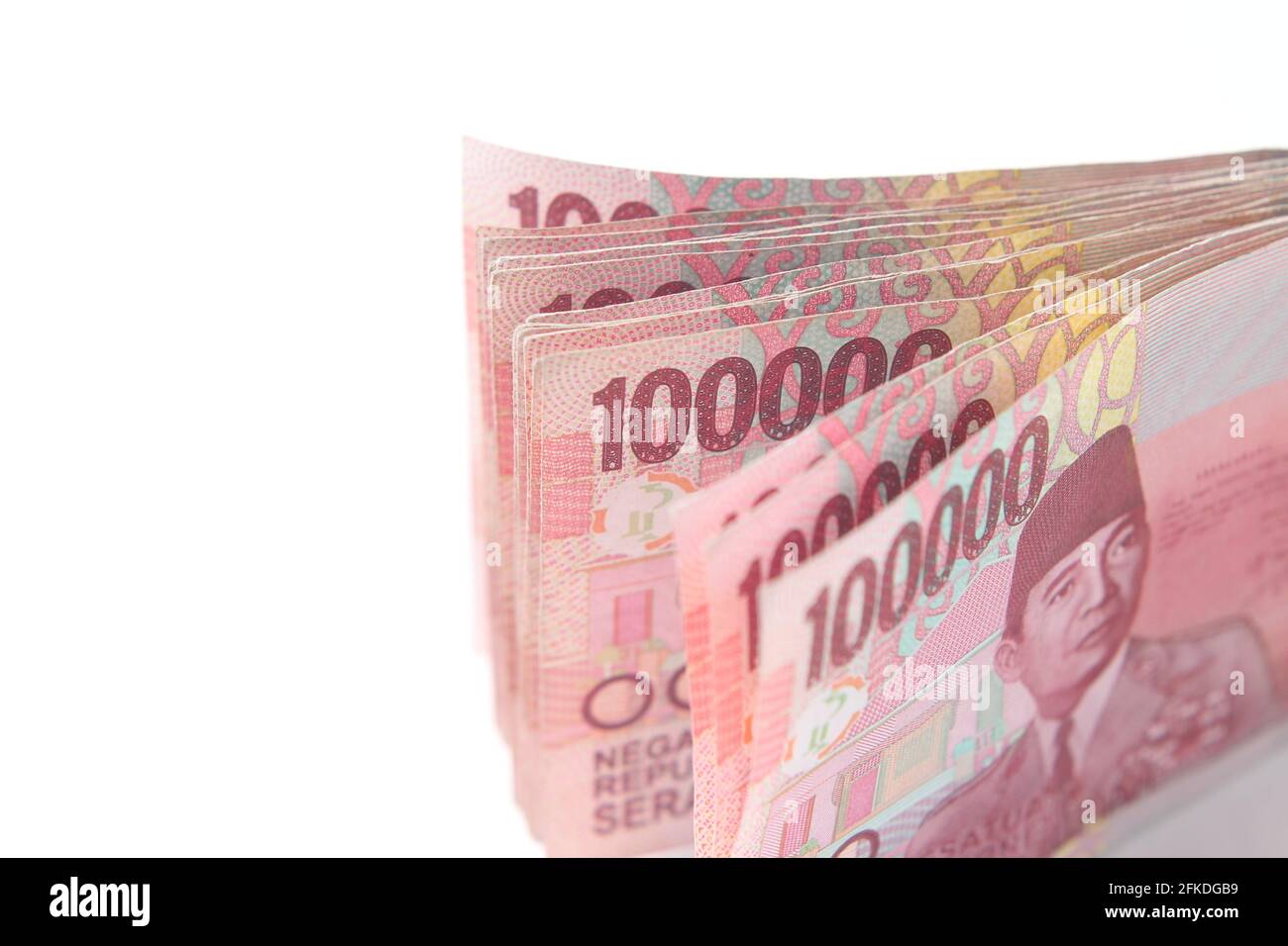 Photo Rupiah Paper Money, Close Up of 100000 at White Background Stock Photo