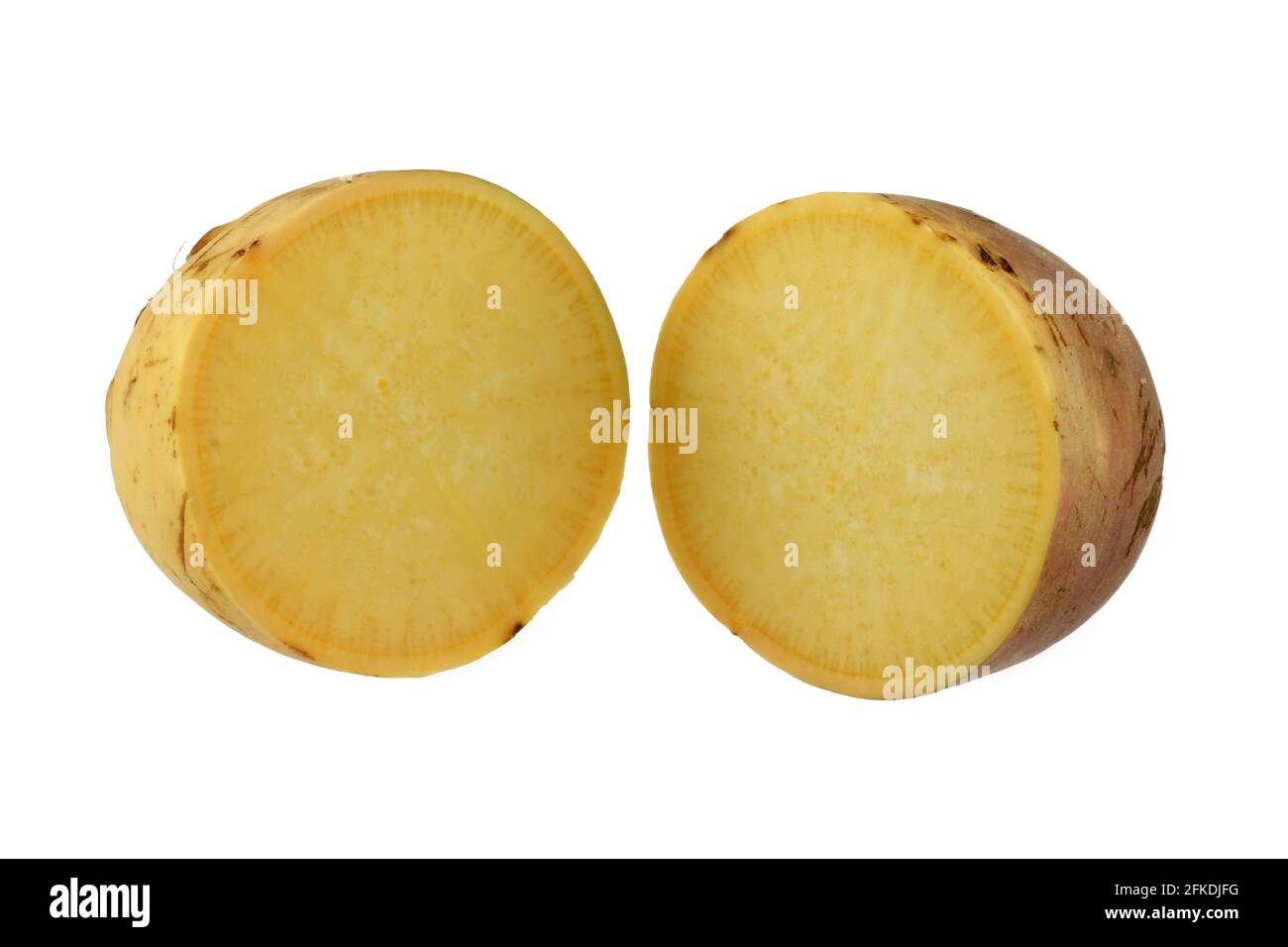 Closeup photo of Turnip (Brassica rapa) cut in half, on a white background Stock Photo