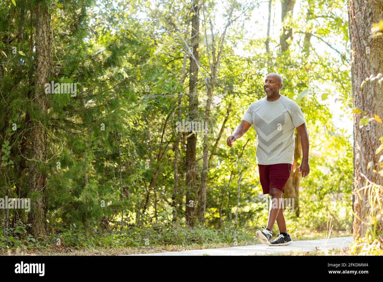 Mature African American man taking a walk outside Stock Photo - Alamy