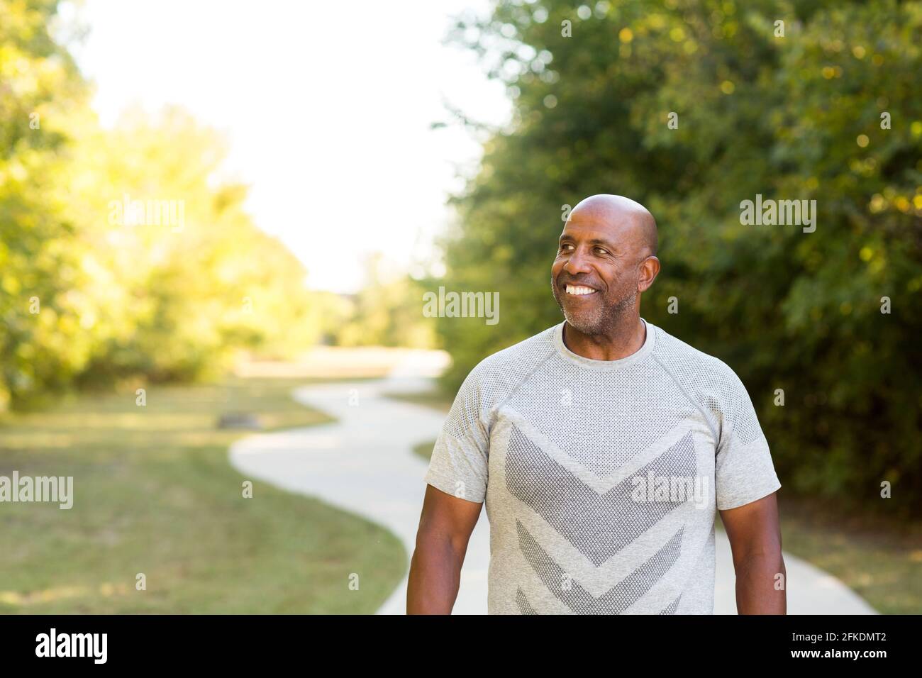 Mature African American man taking a walk outside. Stock Photo