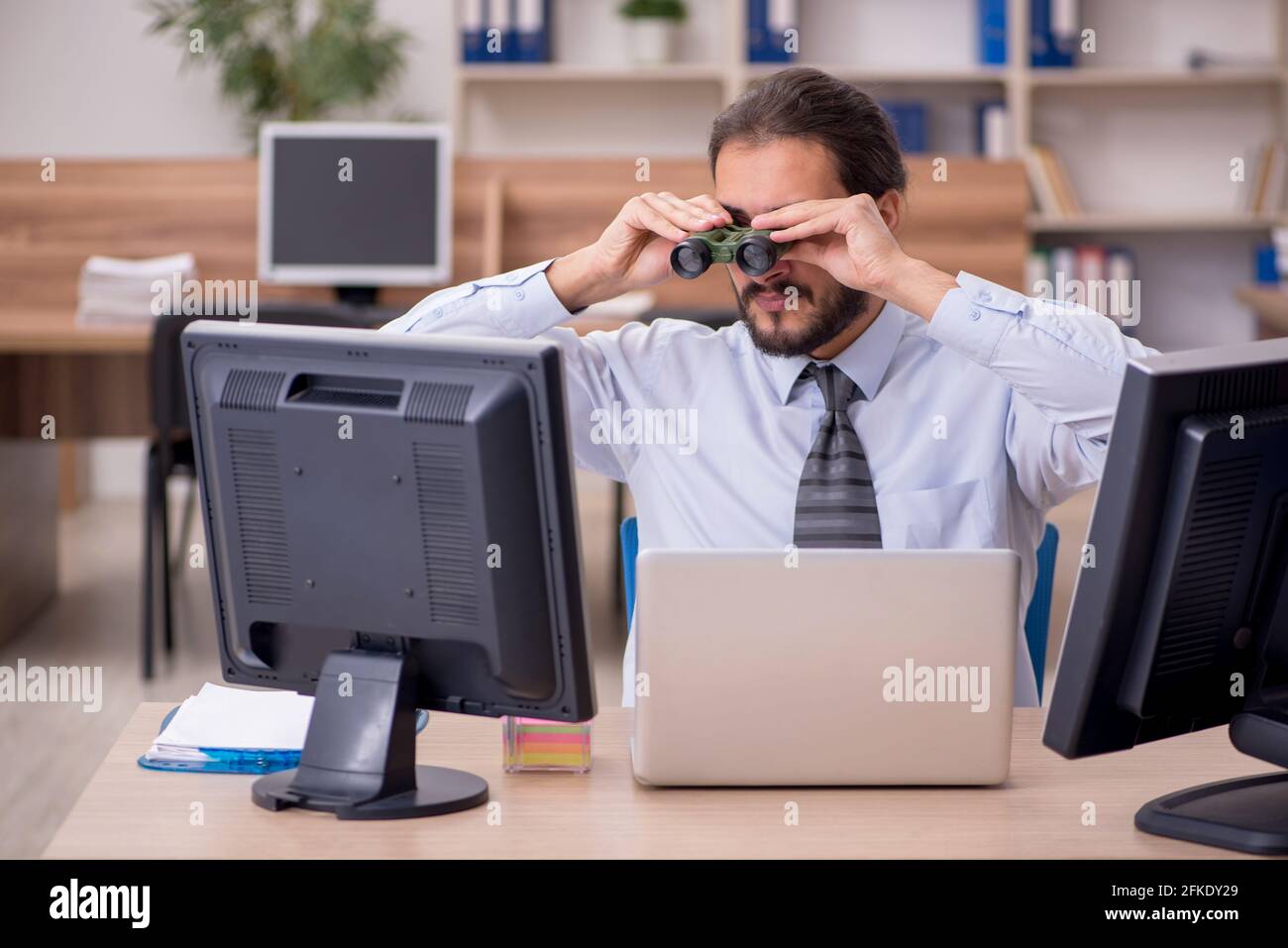 Multitasking young businessman inside office hi-res stock photography ...