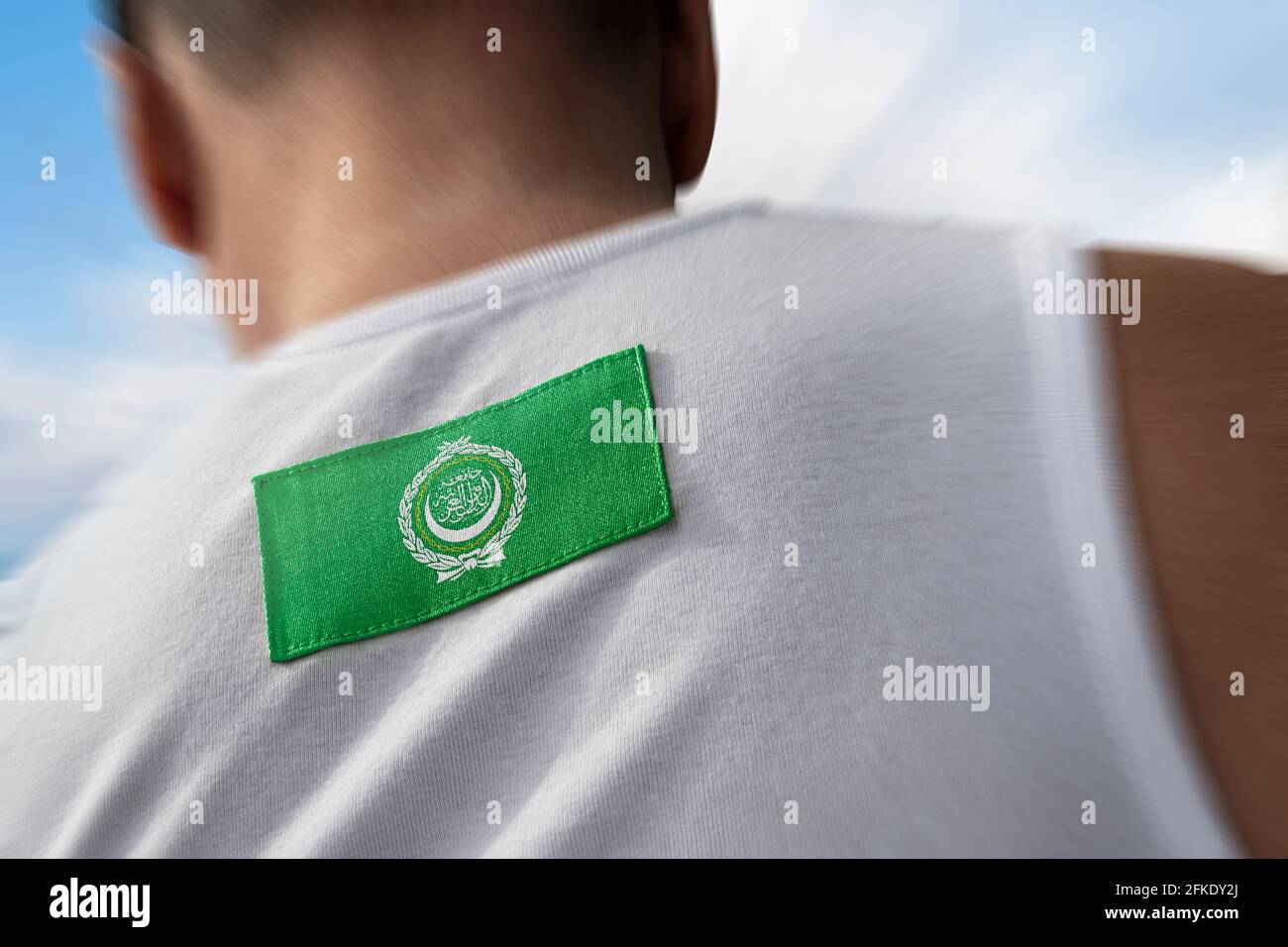 The national flag of Arab League on the athlete's back Stock Photo