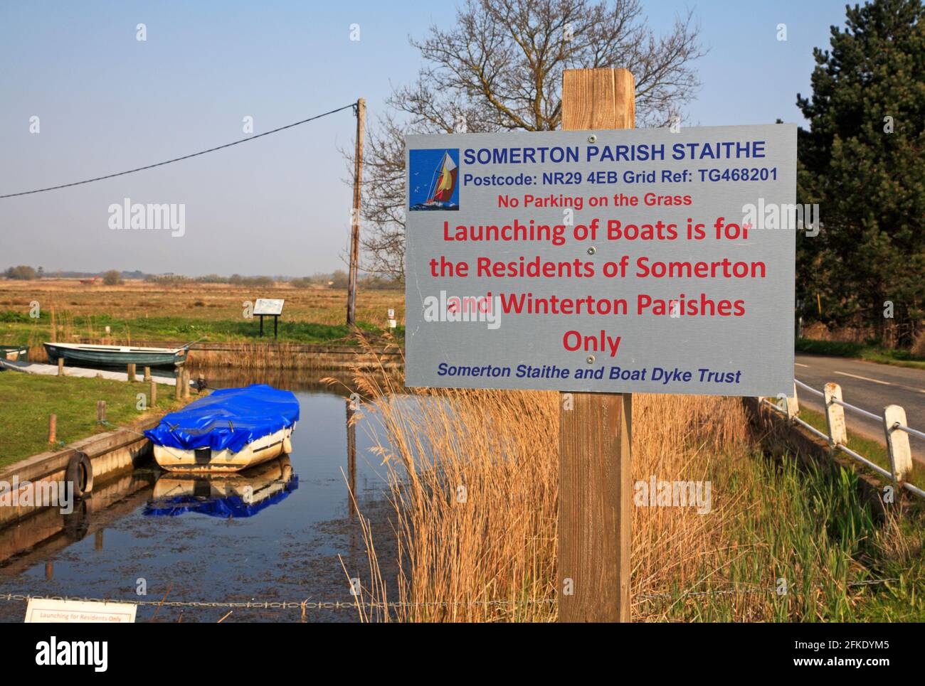 A notice at Somerton Parish Staithe detailing residents boat launching access at West Somerton, Norfolk, England, United Kingdom. Stock Photo