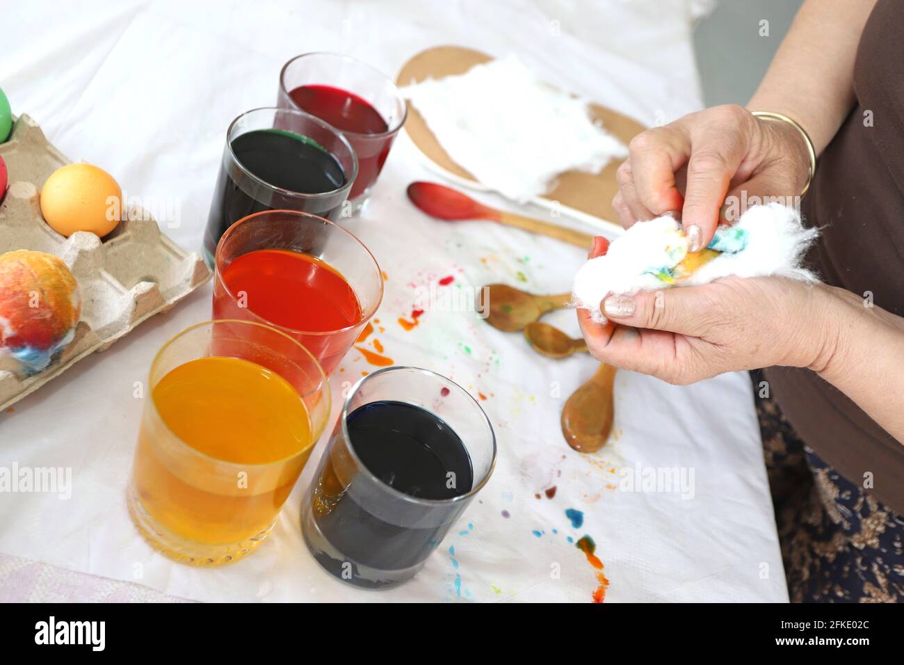 Coloring and painting Easter eggs. Happy Easter Stock Photo