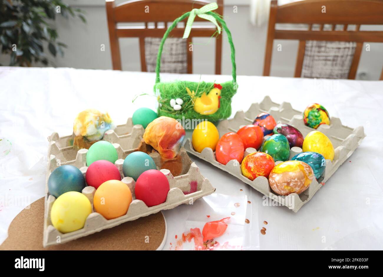 Coloring and painting Easter eggs. Happy Easter Stock Photo