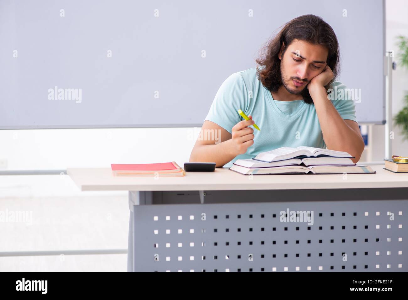 Getting Ready For Testing Young student preparing for exams in the classroom Stock Photo - Alamy