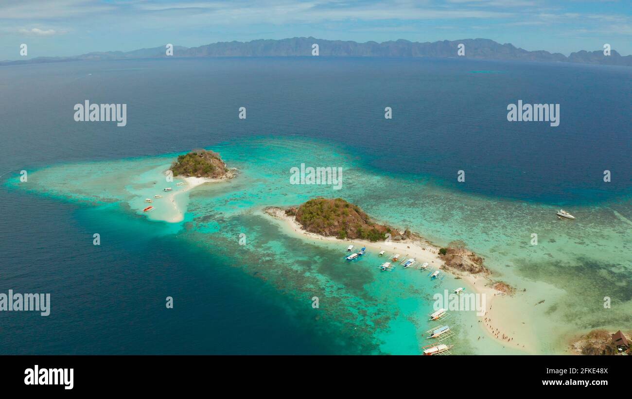 aerial view tropical island with sand white beach. Bulog Dos ...