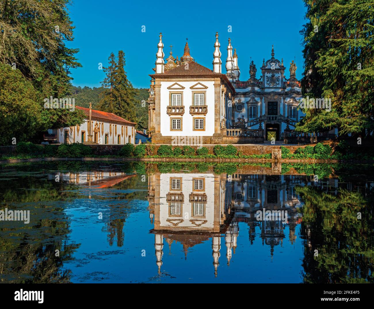 Mateus, near Vila Real, Vila Real District, Portugal. Casa de Mateus.  Facade of the manor house seen across the reflecting pool. Stock Photo