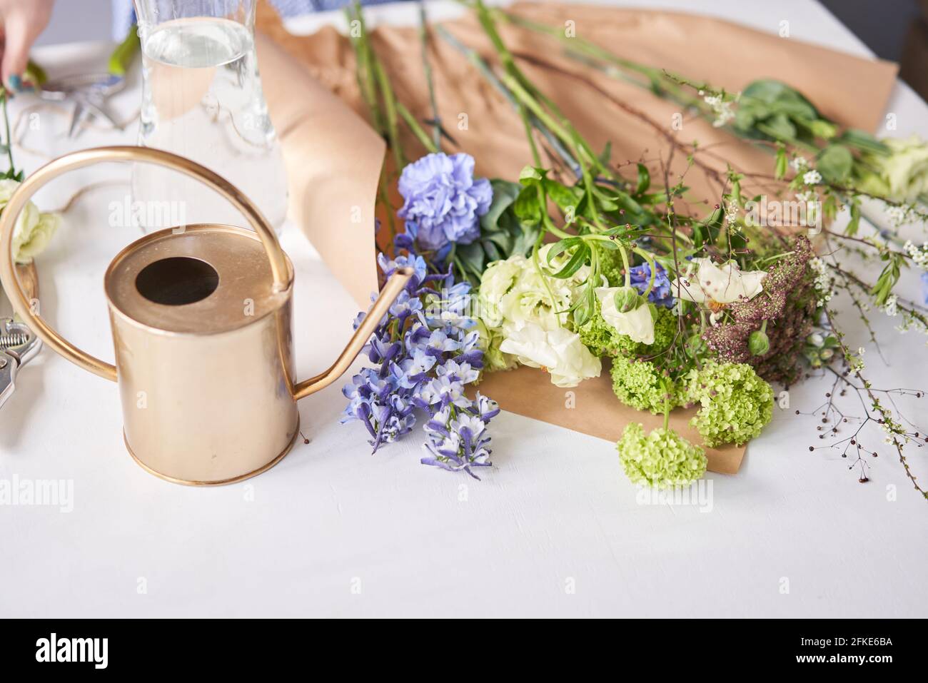Flowers bunch, set for home. Fresh cut flowers for decoration home. European floral shop. Delivery fresh cut flower. Stock Photo