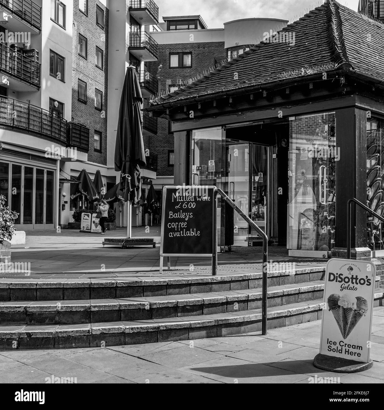 Kingston London UK, April 2021, Cafe Kiosk With No People In A Pedestrian Area With Luxury Apartments In The Background Stock Photo