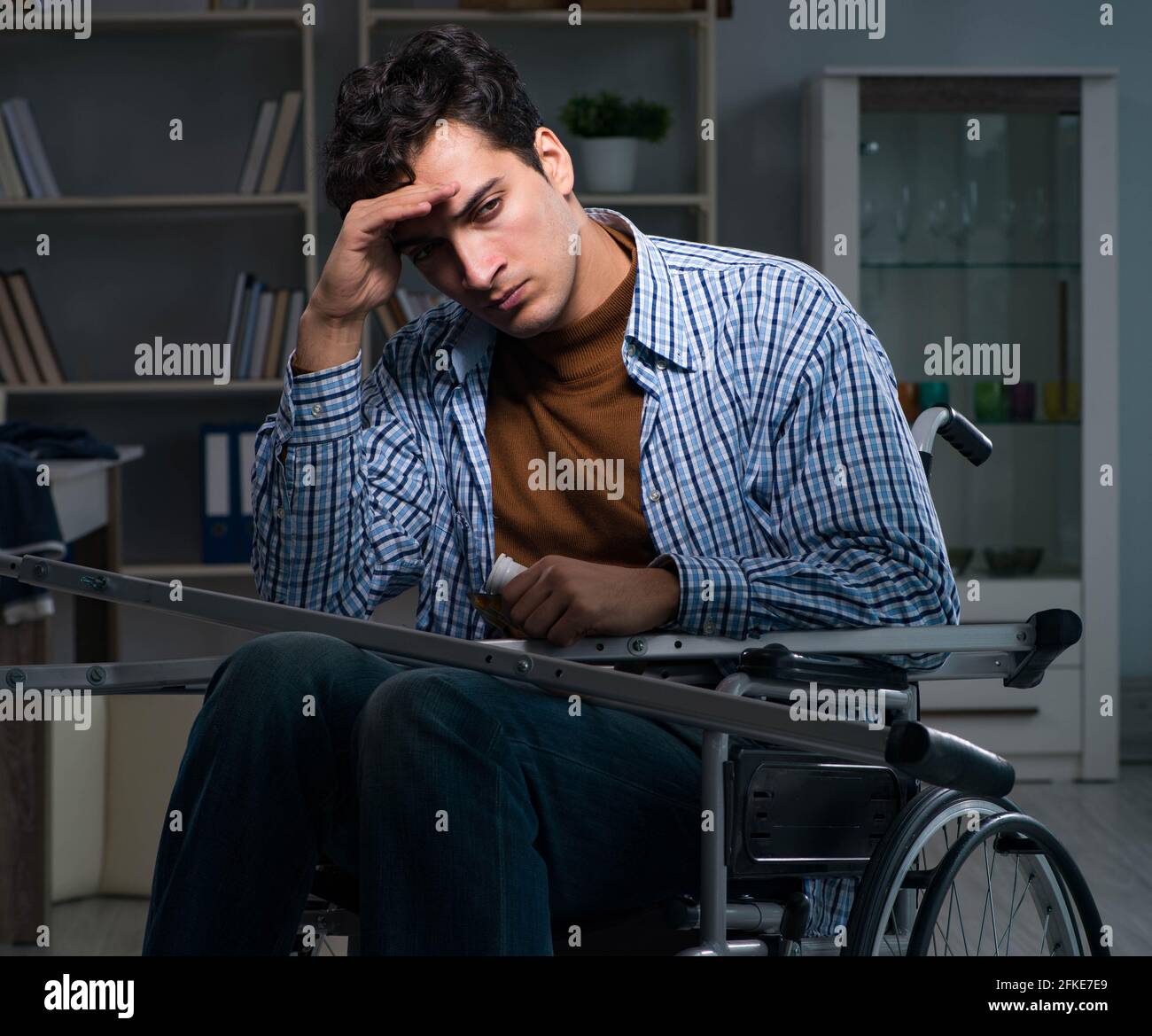 The man suffering from depression at wheelchair Stock Photo Alamy