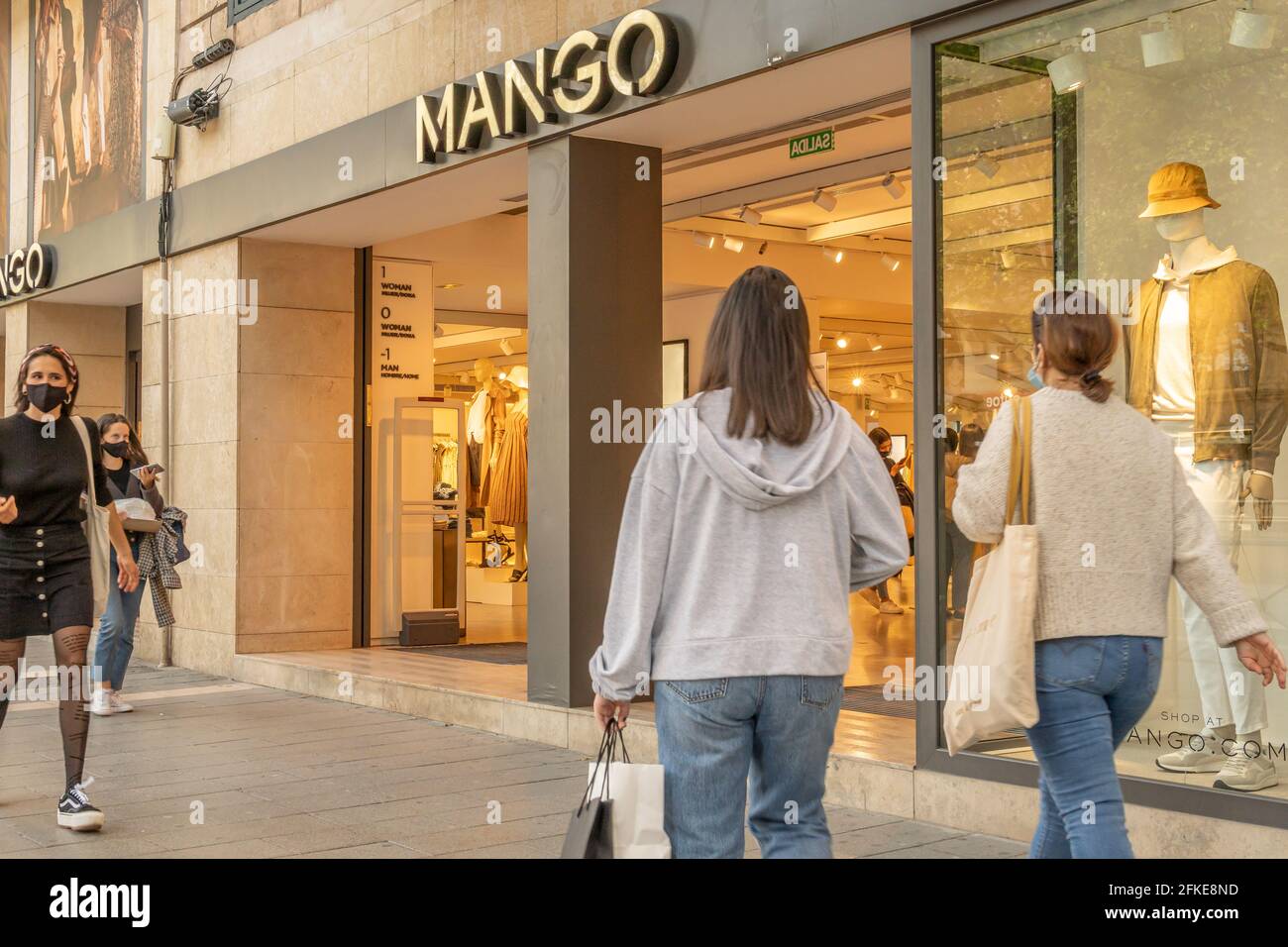 Palma de Mallorca, Spain; april 23 2021: Shop window of a clothing and accessories store belonging to the multinational Mango, with wearing fac Stock Photo Alamy