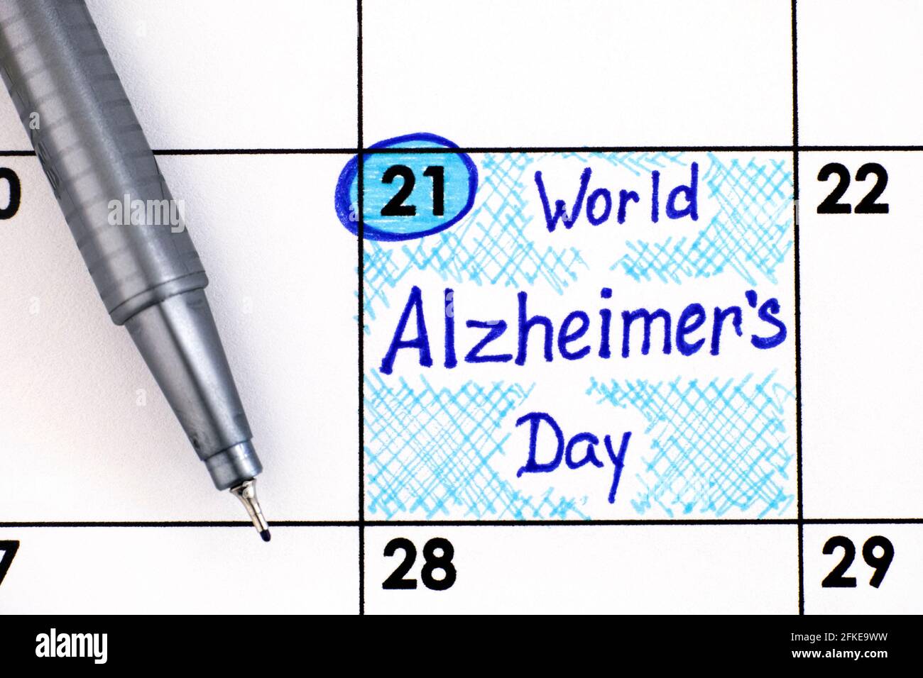Reminder World Alzheimer's Day in calendar with pen. September 21 Stock Photo Alamy