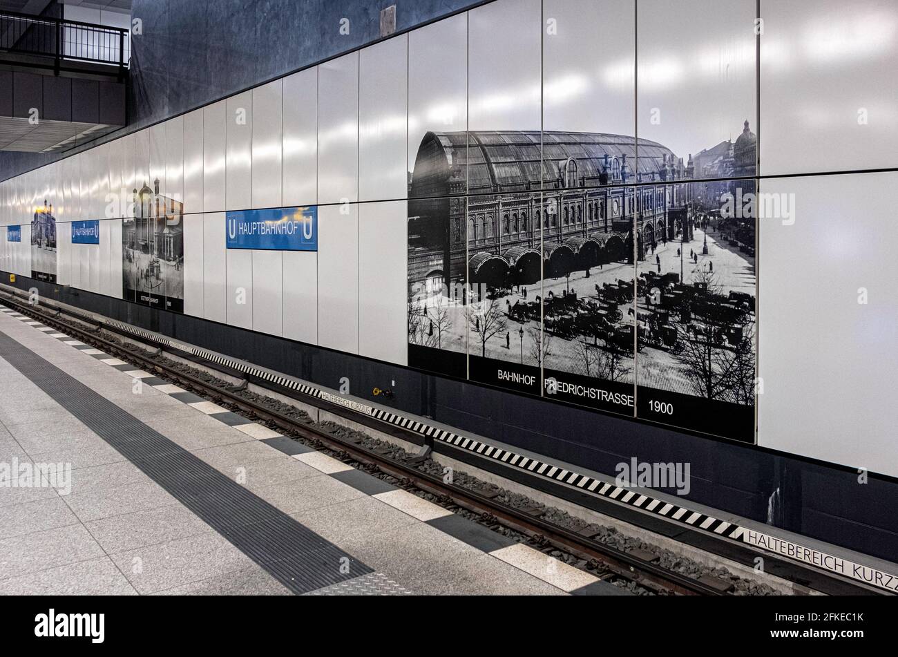 Berlin Hauptbahnhof railway station. Platform of U55 U-bahn railway line to the Brandenbutg Gate. Newest U-bahn line with white tiled walls & old hist Stock Photo