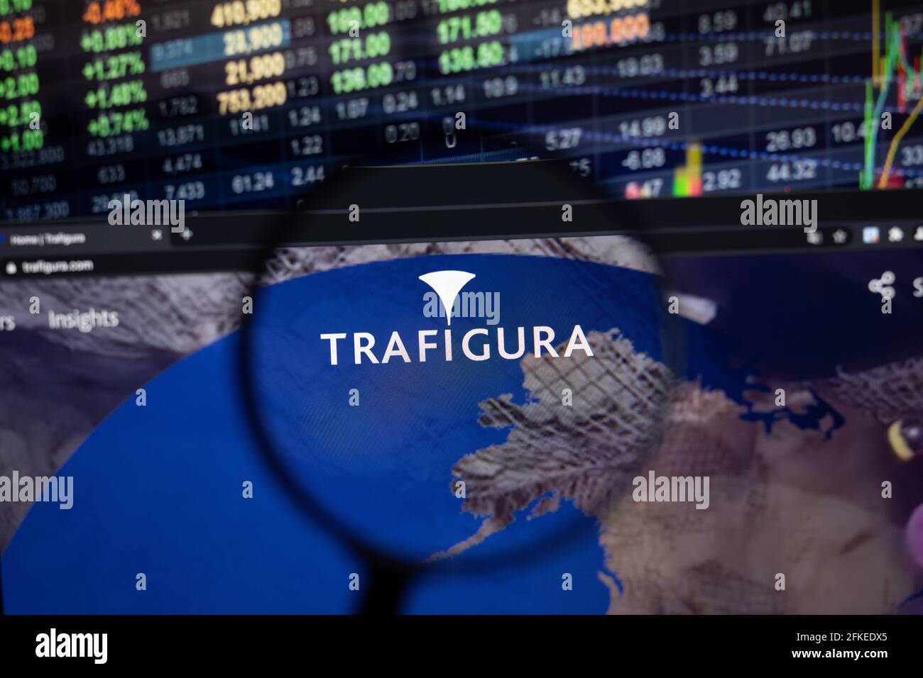 Trafigura Company Logo On A Website With Blurry Stock Market ...