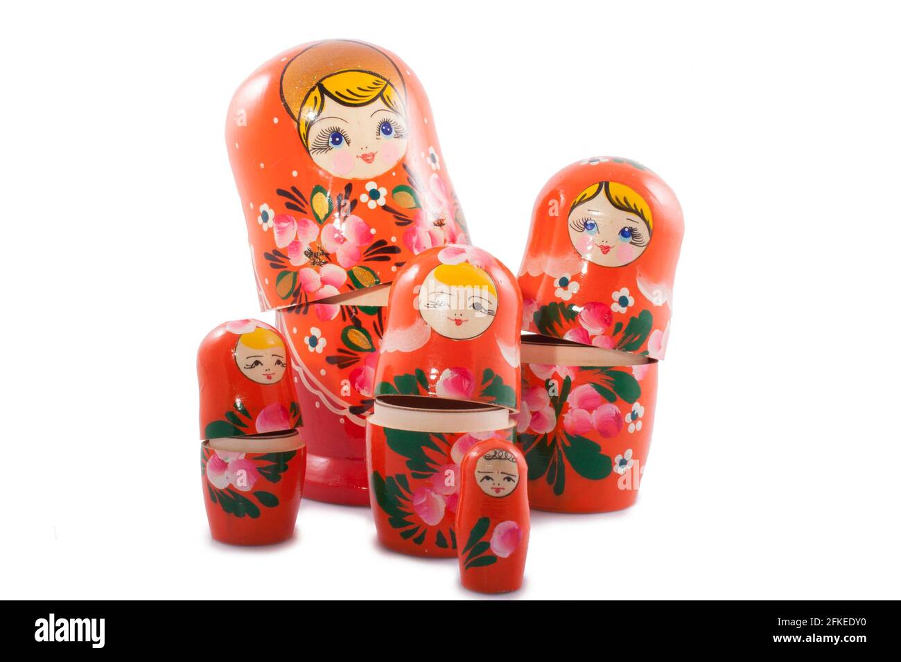 wooden souvenir dolls isolated on a white backgroud Stock Photo