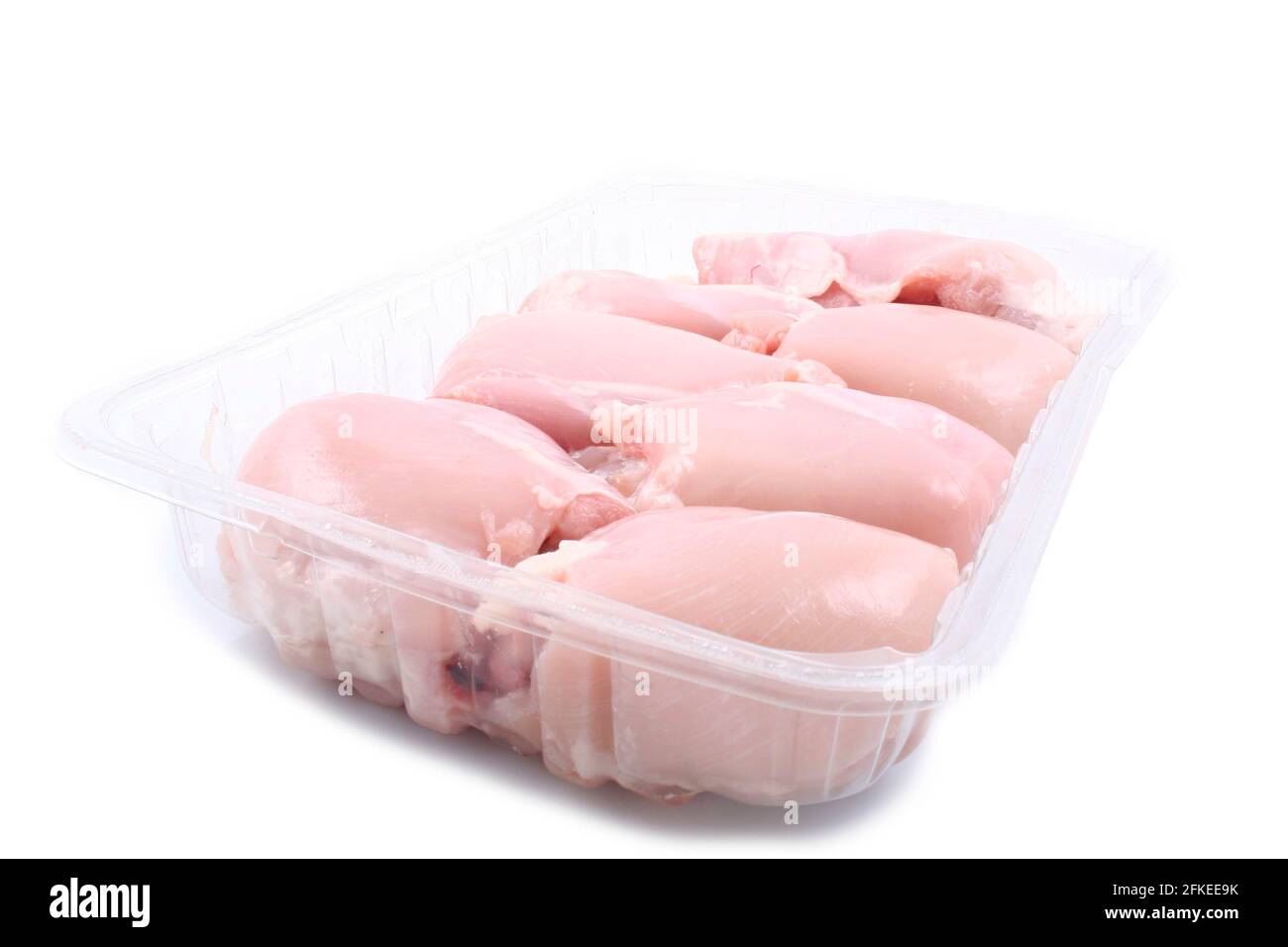 raw chicken thighs isolated on a white background Stock Photo